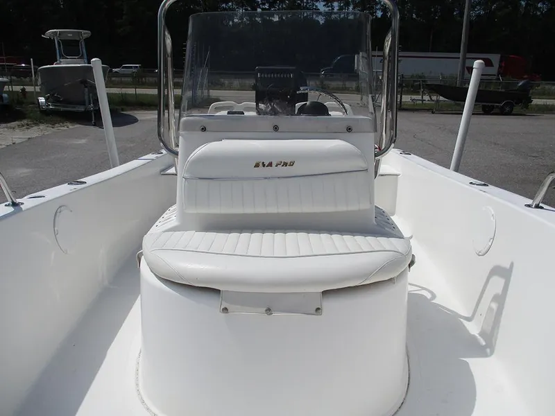 Slide: The Image of 2004 Sea Pro 180 Center Console boat with white seating and steering console. - 15