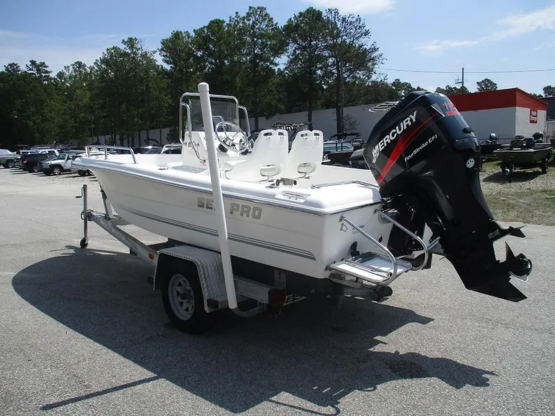 Slide: The Image of 2004 Sea Pro 180 Center Console boat on trailer with Mercury outboard engine. - 3
