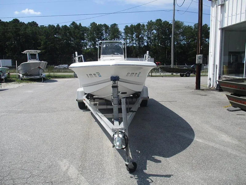 Slide: The Image of 2004 Sea Pro 180 Center Console boat on trailer, parked outdoors. - 4