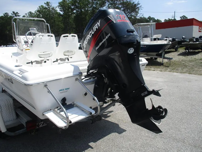 Slide: The Image of 2004 Sea Pro 180 Center Console boat with Mercury 115 outboard motor. - 9
