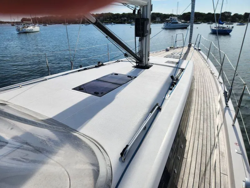 Slide: The Image of 2018 X-Yachts X4.9 sailboat deck with scenic harbor view. - 16