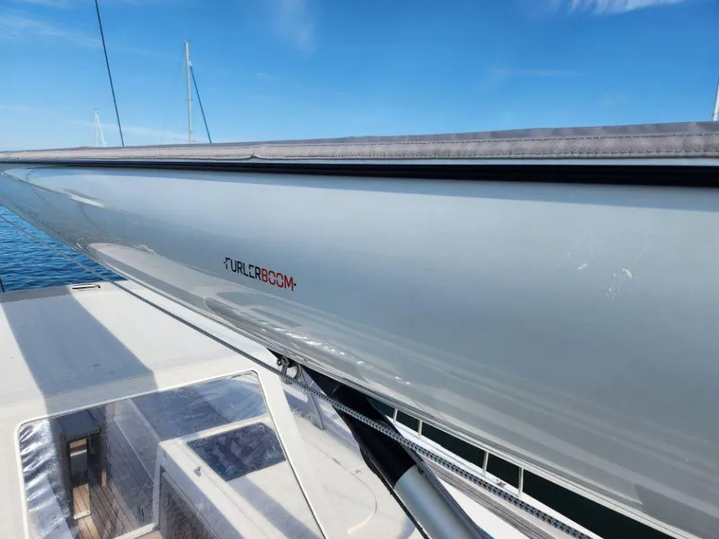 Slide: The Image of 2018 X-Yachts X4.9 sailboat with Furlerboom, under clear blue sky. - 19