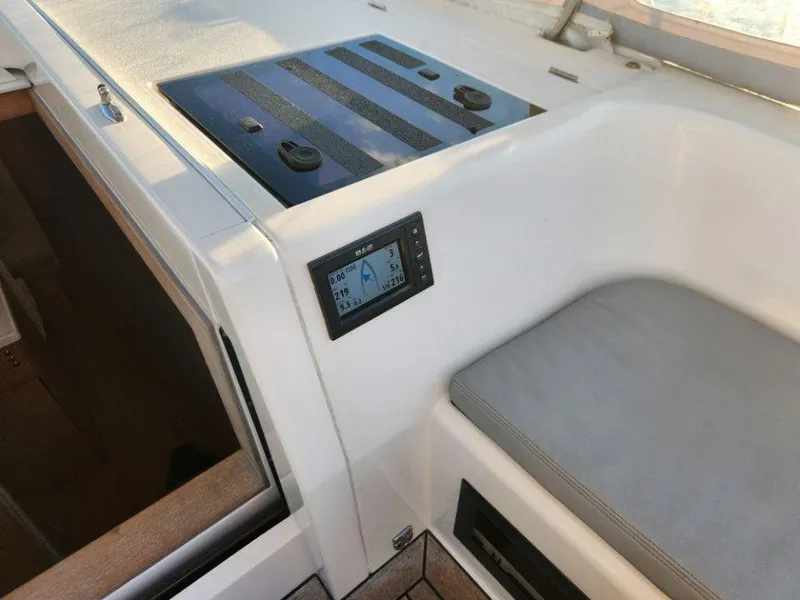 Slide: The Image of Interior view of 2018 X-Yachts X4.9 sailboat with navigation display and seating area. - 29