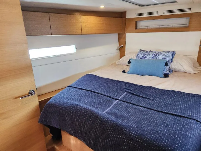 Slide: The Image of Luxurious cabin interior of 2018 X-Yachts X4.9 with cozy bedding and modern design. - 34