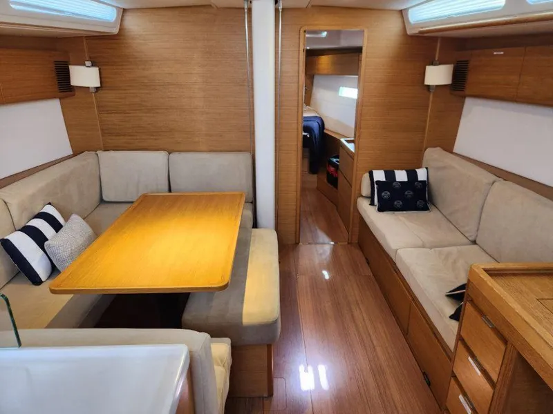 Slide: The Image of Luxurious interior of 2018 X-Yachts X4.9 with wooden finish and cozy seating. - 39