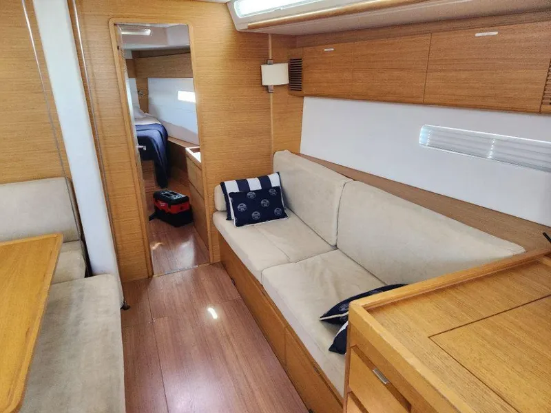 Slide: The Image of Interior of 2018 X-Yachts X4.9, featuring cozy seating and wooden finishes. - 40