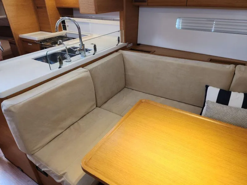 Slide: The Image of Interior of 2018 X-Yachts X4.9 featuring a cozy dining area and modern kitchen. - 44