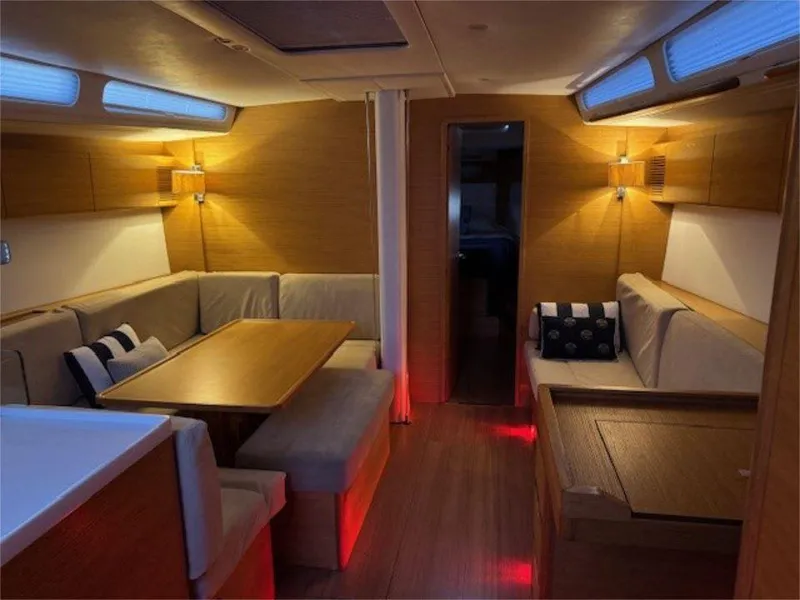 Slide: The Image of Luxurious interior of 2018 X-Yachts X4.9 with cozy seating and ambient lighting. - 46