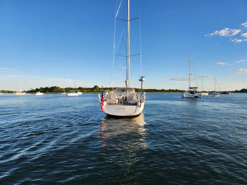 Slide: The Image of Sailboat X-Yachts X4.9 (2018) on calm water under clear blue sky. - 9