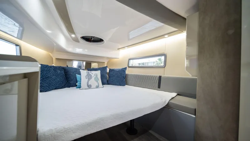 Slide: The Image of Luxurious interior cabin of 2025 Hanover 387 Outboard boat with cozy bedding. - 34