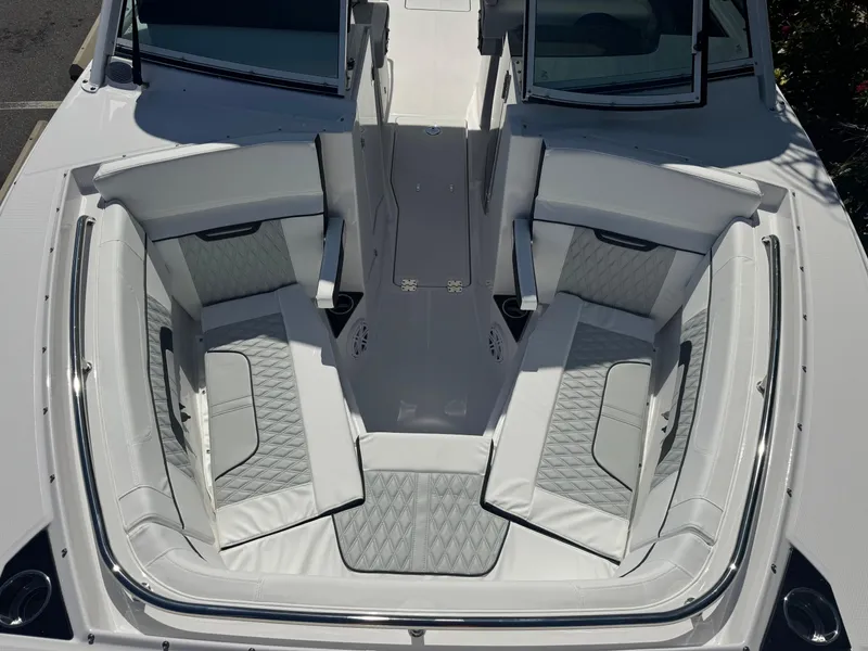 Slide: The Image of 2026 Blackfin 272 DC boat interior with luxurious white seating and modern design. - 35