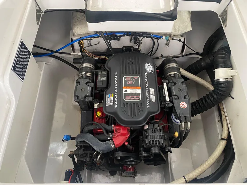 Slide: The Image of 2008 Four Winns H260 boat engine compartment with Volvo Penta 6.7L engine. - 7