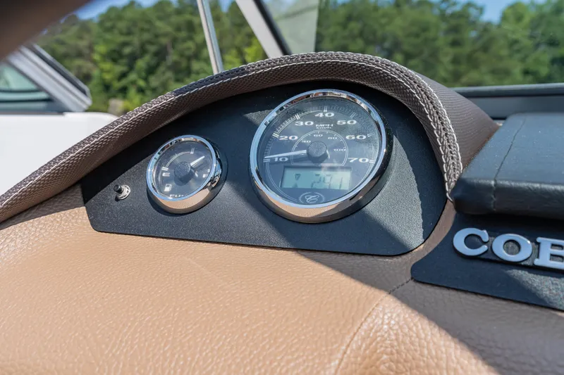 Slide: The Image of Dashboard of a 2016 Cobalt 200 boat with speedometer and tachometer. - 20
