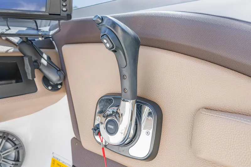 Slide: The Image of Throttle control lever on a 2016 Cobalt 200 boat dashboard. - 6