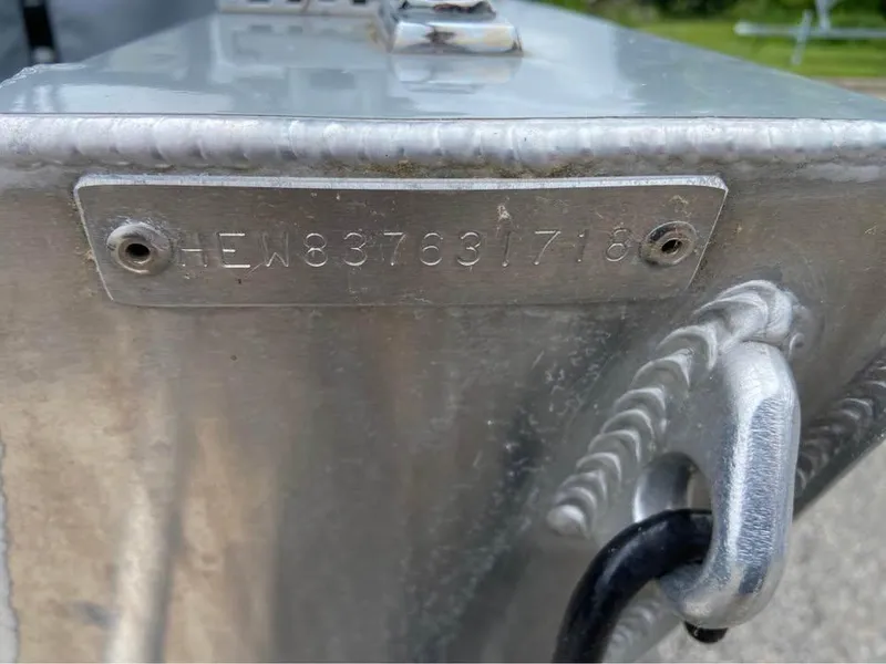 Slide: The Image of 2018 Hewescraft 160 Sportsman boat hull identification number plate. - 10