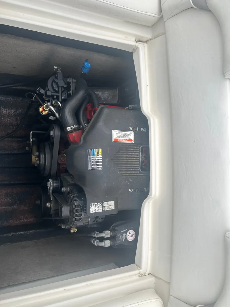 Slide: The Image of Engine compartment of a 2005 Stingray 250 LR boat, featuring a Volvo Penta engine. - 5