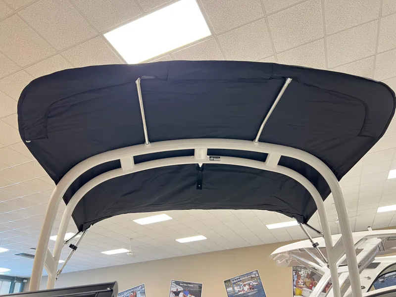 Slide: The Image of 2025 Yamaha AR190 boat engine detail with safety instructions and components visible. - 12