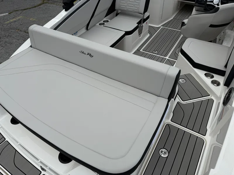 Slide: The Image of 2025 Sea Ray SPX 210 boat interior with sleek seating and modern design. - 5