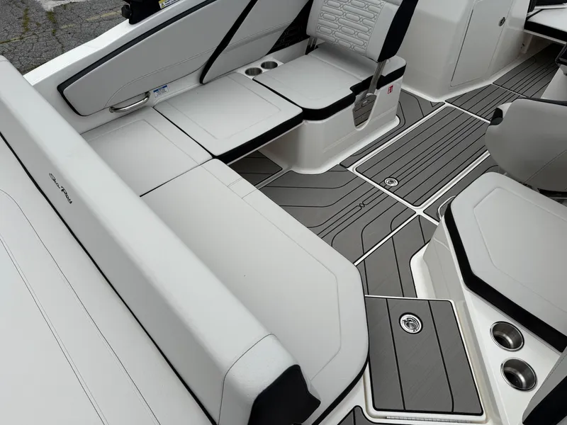 Slide: The Image of 2025 Sea Ray SPX 210 boat interior with sleek seating and modern design. - 6