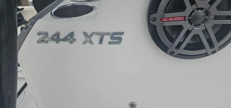 Slide: The Image of 2014 NauticStar 244 XTS boat with JL Audio speaker detail. - 2