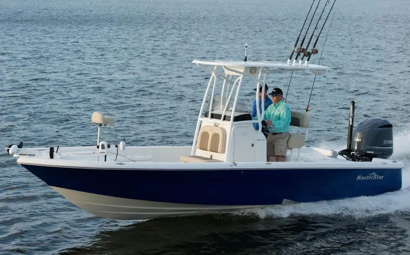 Slide: The Image of Manufacturer Provided Image: 2014 NauticStar 244 XTS boat cruising on the water. - 5