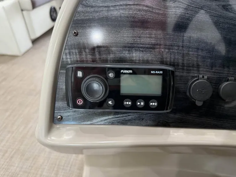 Slide: The Image of 2020 Godfrey SR 226 BF boat dashboard with Fusion MS-RA55 stereo system. - 10