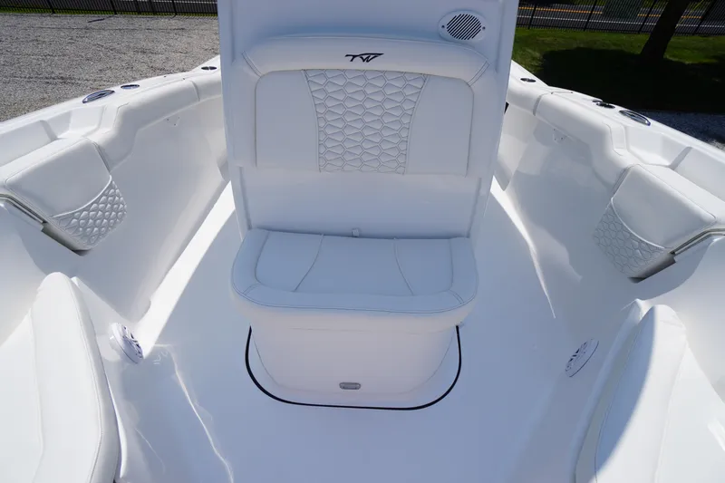 Slide: The Image of 2026 Tidewater 232 LXF boat interior with white seating and modern design. - 22