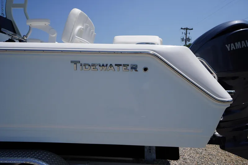 Slide: The Image of 2026 Tidewater 232 LXF boat side view with Yamaha engine. - 3