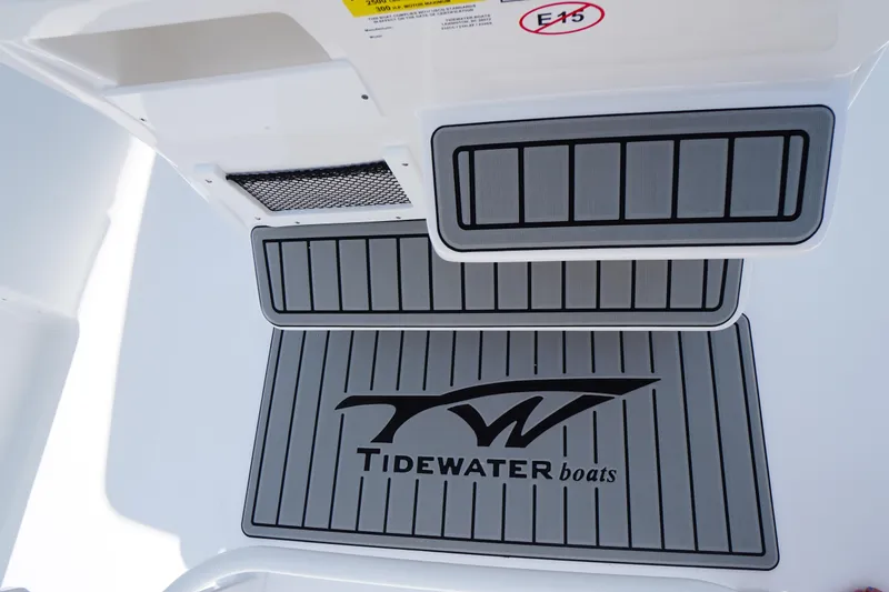 Slide: The Image of 2026 Tidewater 232 LXF boat deck with logo and non-slip surface. - 30