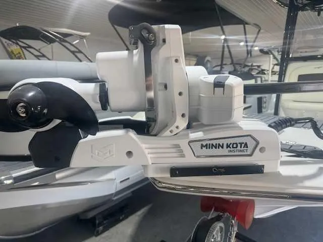 Slide: The Image of Minn Kota Instinct motor on 2024 Tidewater 2210CB boat, indoor display. - 11