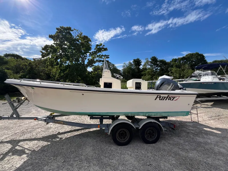 Slide: The Image of 2005 Parker 2100 Special Edition boat on trailer under clear blue sky. - 0
