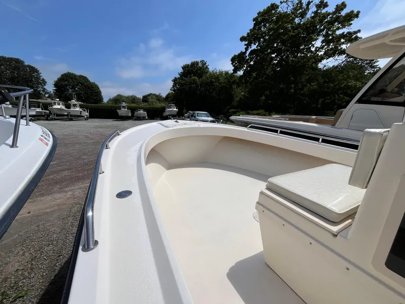 Slide: The Image of 2005 Parker 2100 Special Edition boat on display under a clear blue sky. - 10