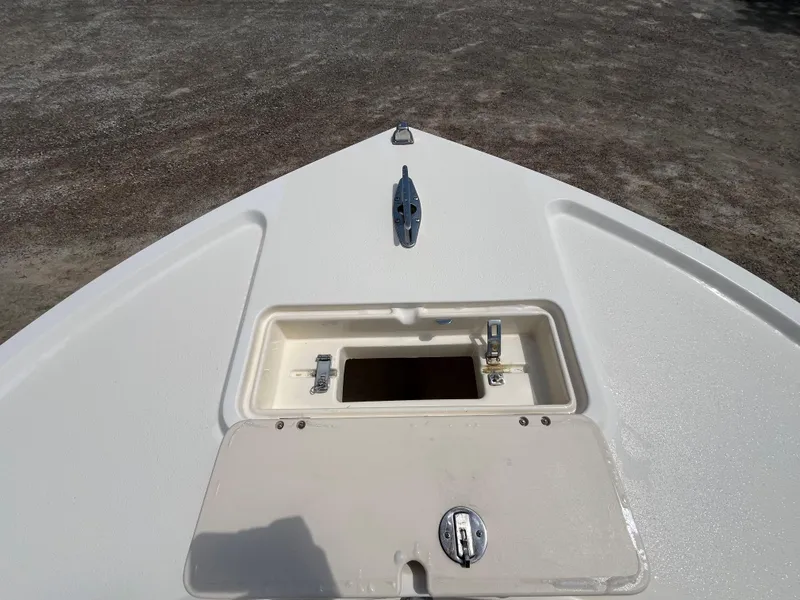 Slide: The Image of Bow of 2005 Parker 2100 Special Edition boat with open storage compartment. - 13