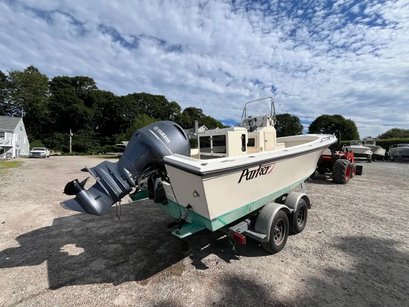 Slide: The Image of 2005 Parker 2100 Special Edition boat with Yamaha outboard motor on a trailer. - 4