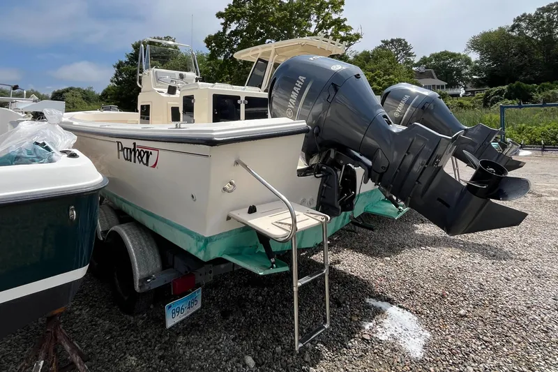 Slide: The Image of 2005 Parker 2100 Special Edition boat with dual Yamaha outboard motors on a trailer. - 40