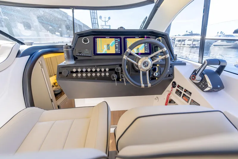 Slide: The Image of Luxurious Hanover 415 yacht cockpit with modern navigation system, 2025 model. - 11