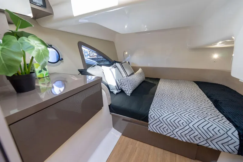 Slide: The Image of Luxurious cabin interior of 2025 Hanover 415 yacht with modern bedding and decor. - 30