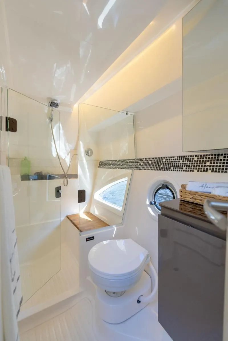 Slide: The Image of Modern bathroom in 2025 Hanover 415 yacht with shower, toilet, and sleek design. - 35