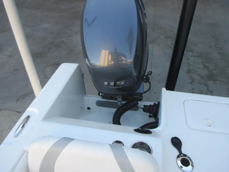 Slide: The Image of 2013 Carolina Cat 230 DC boat with Yamaha 115 outboard motor. - 8