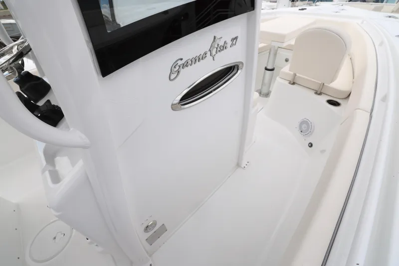 Slide: The Image of 2025 Sea Hunt Gamefish 27 Forward Seating boat interior. - 17