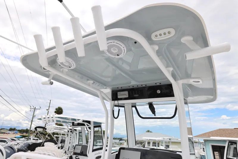 Slide: The Image of 2025 Sea Hunt Gamefish 27 Forward Seating boat with overhead rod holders and electronics. - 20