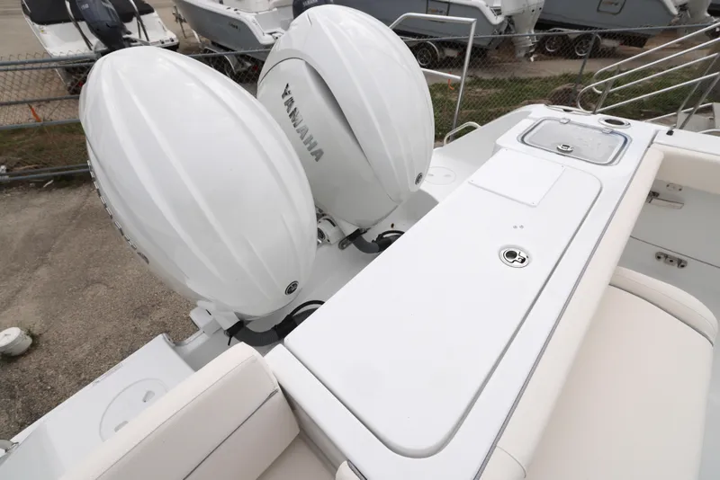 Slide: The Image of 2025 Sea Hunt Gamefish 27 Forward Seating with twin Yamaha outboard engines. - 23