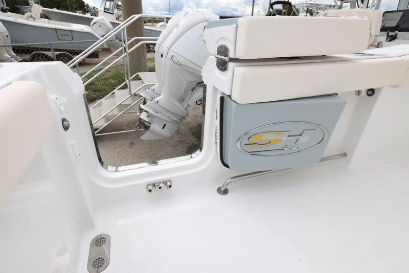 Slide: The Image of 2025 Sea Hunt Gamefish 27 Forward Seating boat, rear seating and engine view. - 26