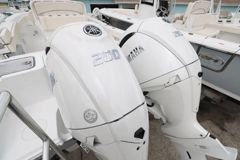 Slide: The Image of 2025 Sea Hunt Gamefish 27 Forward Seating with twin Yamaha 200 outboard engines. - 31