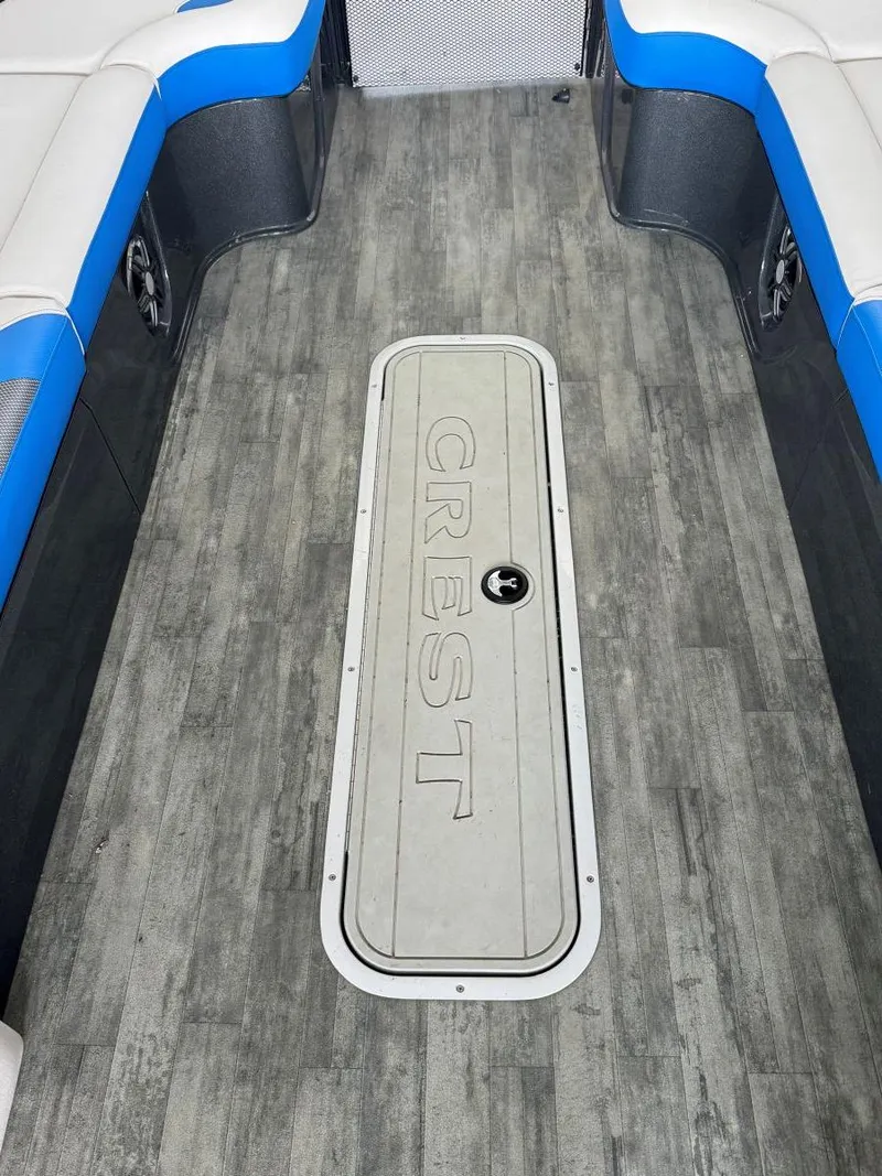 Slide: The Image of Interior of 2022 Crest Caribbean RS 250 SLRC boat with stylish seating and flooring. - 34