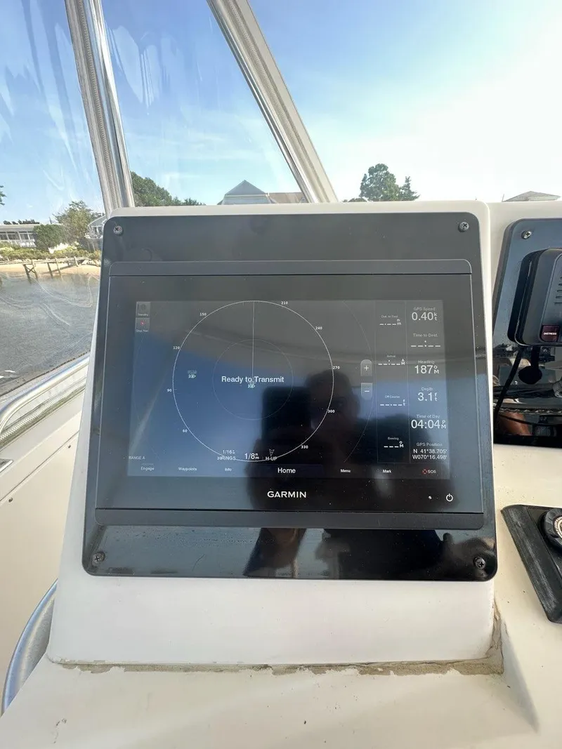 Slide: The Image of Garmin navigation system on a 2005 Cabo 35 Flybridge boat. - 11
