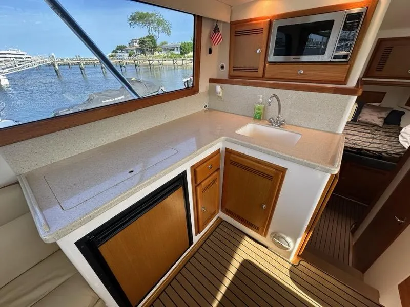Slide: The Image of Interior view of Cabo 35 Flybridge yacht kitchen, 2005 model. - 17