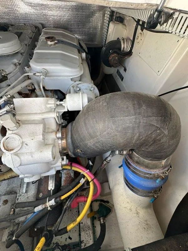 Slide: The Image of Engine compartment of a 2005 Cabo 35 Flybridge boat. - 35