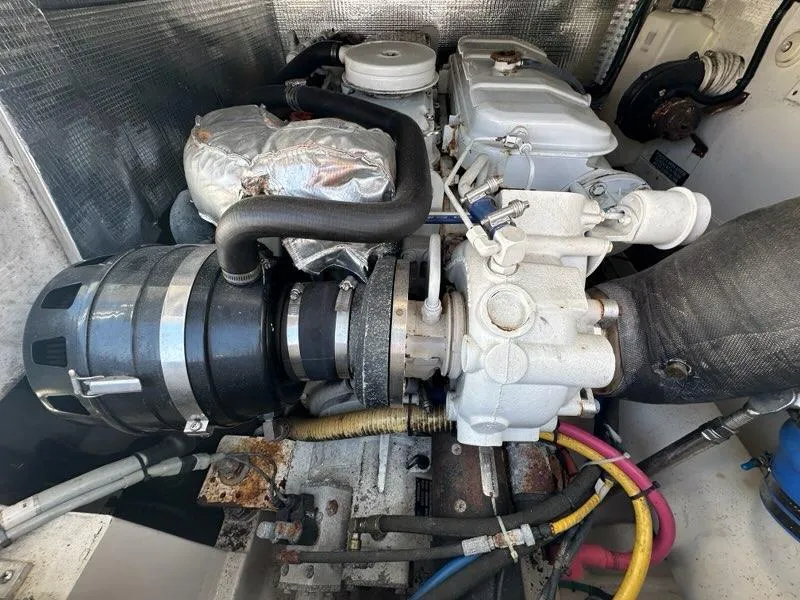 Slide: The Image of Engine compartment of a 2005 Cabo 35 Flybridge boat. - 36