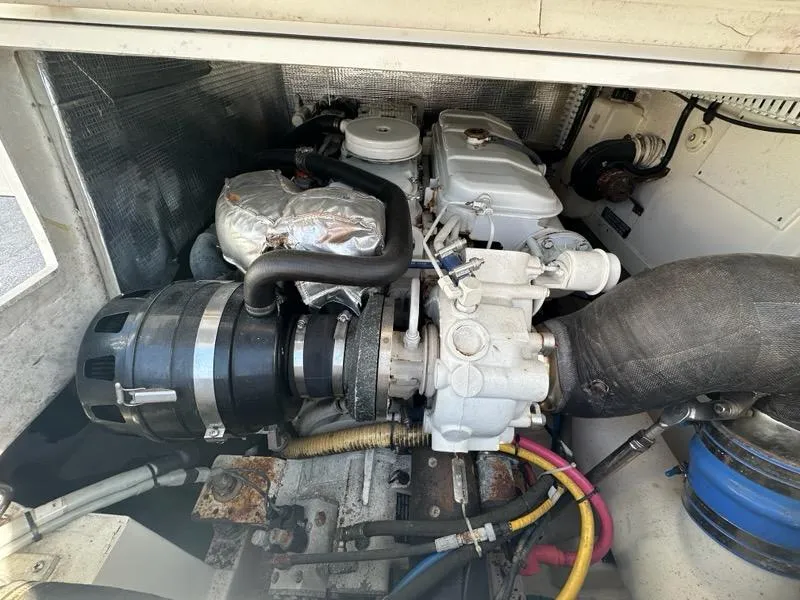Slide: The Image of Engine compartment of a 2005 Cabo 35 Flybridge boat. - 38